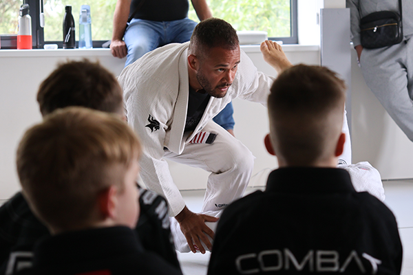 Instructor demonstrating BJJ technique - Technical Mastery